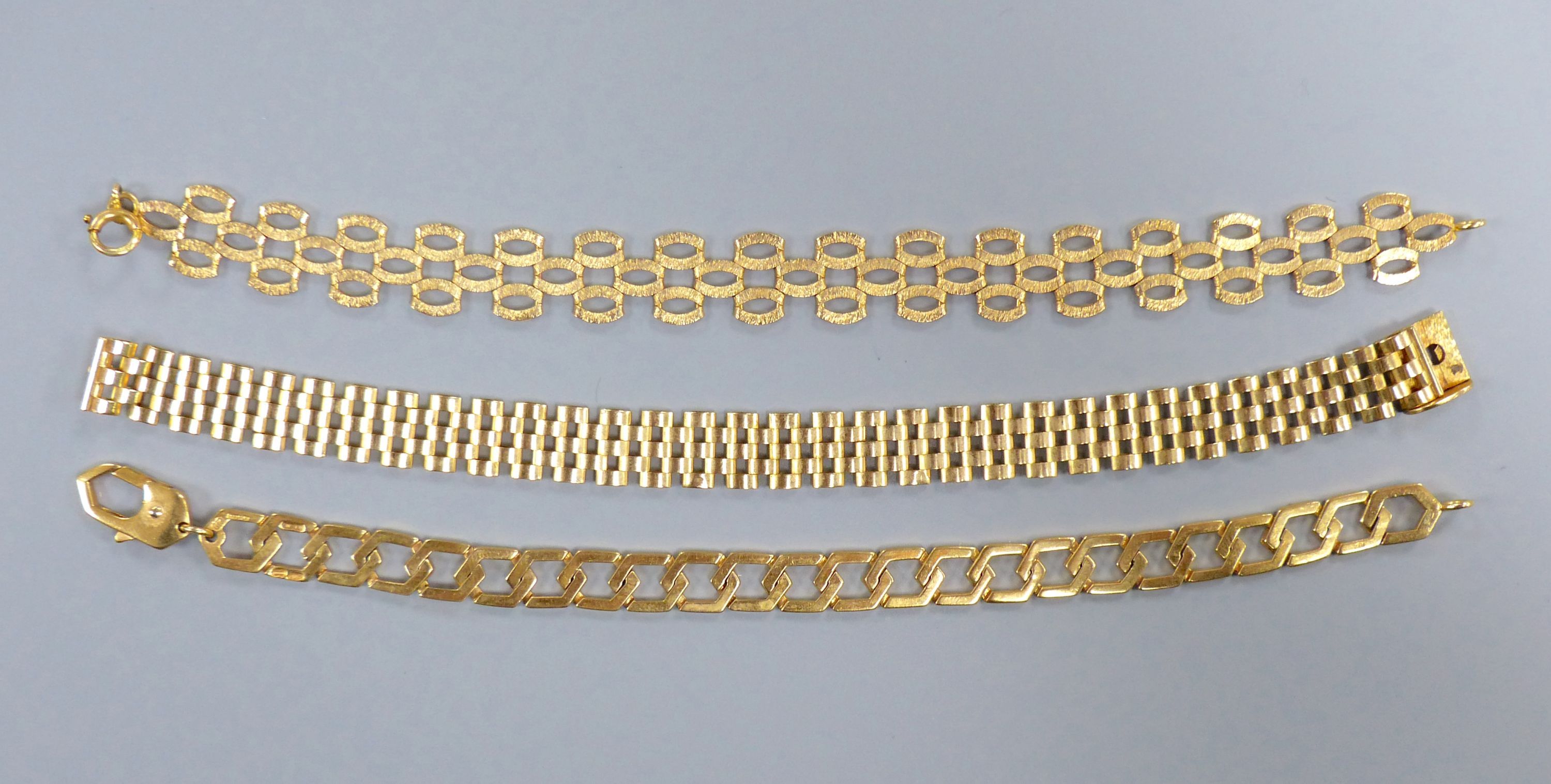 Three assorted modern 9ct gold bracelets, all approx. 18cm,